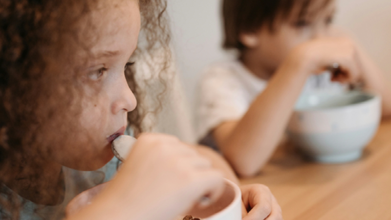 Two children eating