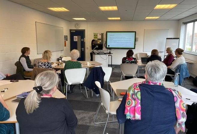 Dr Gita Hedin, an Early Career Researcher, presenting her research at the Social Care Symposium.